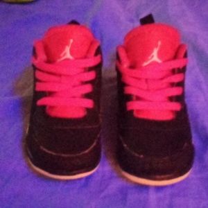 Pink and black Jordan's